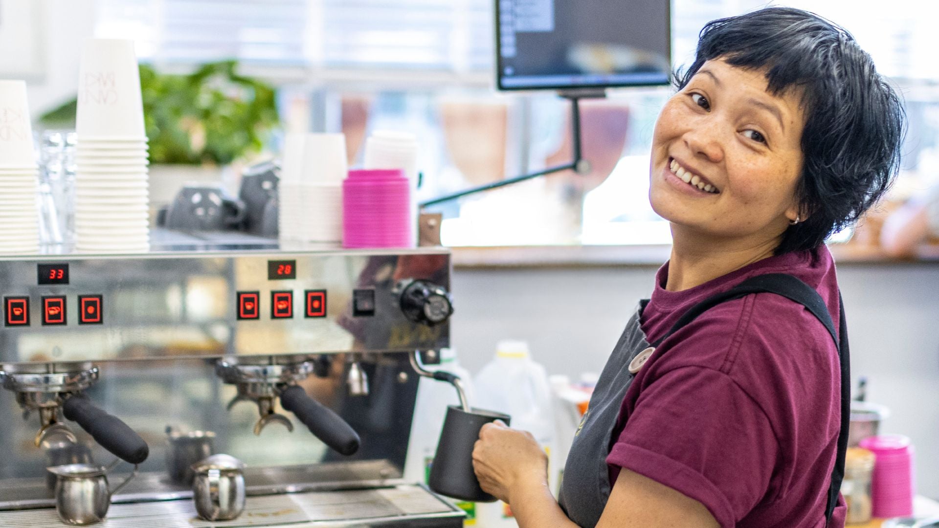 Donna making coffee at Candied Bakery