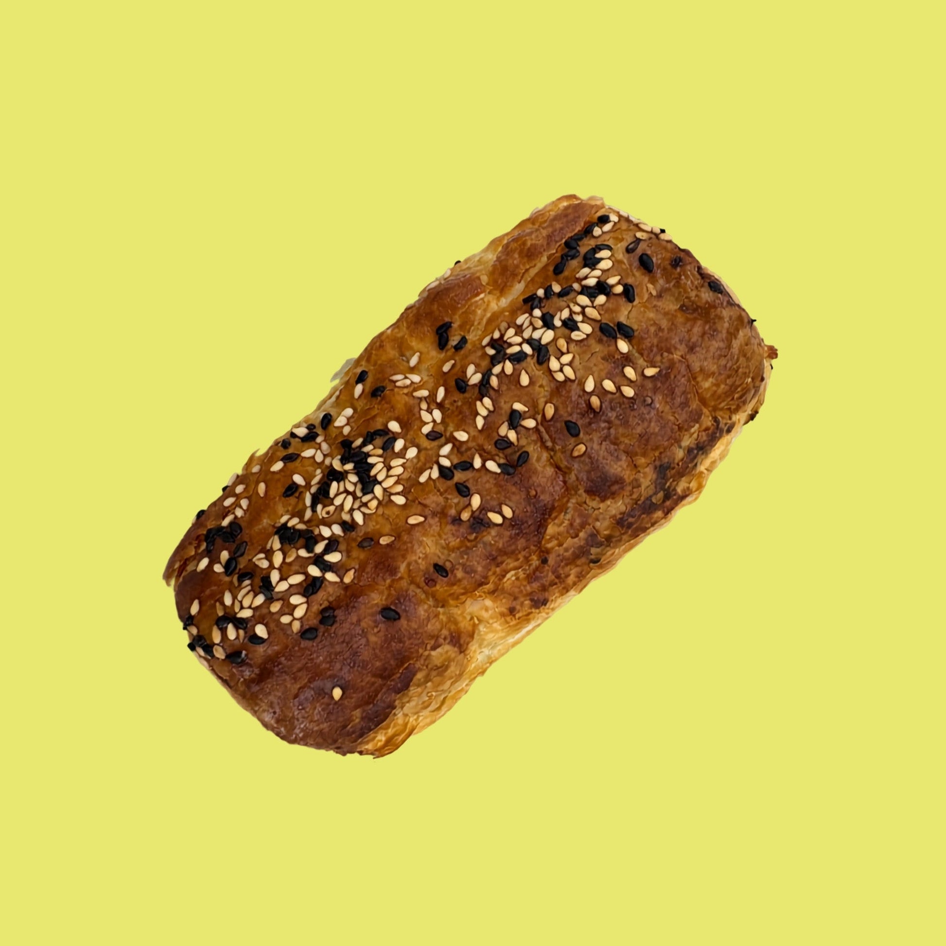 Organic Pork Dim Sim Sausage Roll with sesame seeds